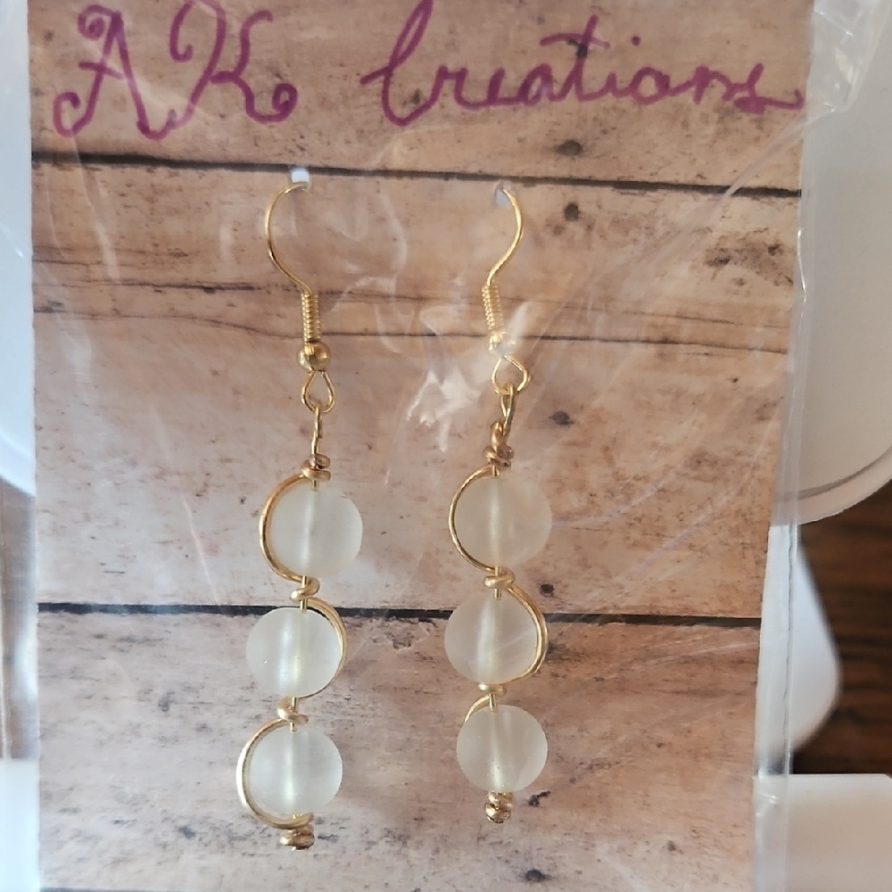 Gold and White Dangle Earrings